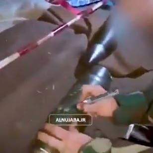 شاهد.. اسم قاسم سليماني على صواريخ "النجباء" التي تستهدف حلب