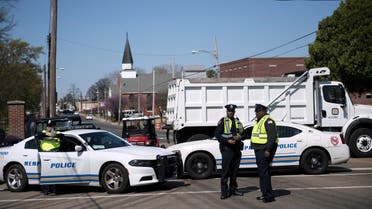 Police stand near a roadblock before a labor march on the 50th anniversary of the assassination of Martin Luther King Jr. April 4, 2018 in Memphis, Tennessee.