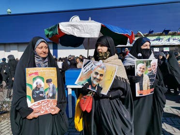 Iranian women carry a portrait of slain Iranian General Qasem Soleimani, on the 40th day of his killing in a US drone strike. (AFP)