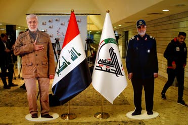 Cardboard cutouts of the Qassem Soleimani and Abu Mahdi al-Mohandes are seen during the forty days memorial in Baghdad, Iraq, February 11, 2020. (Reuters)