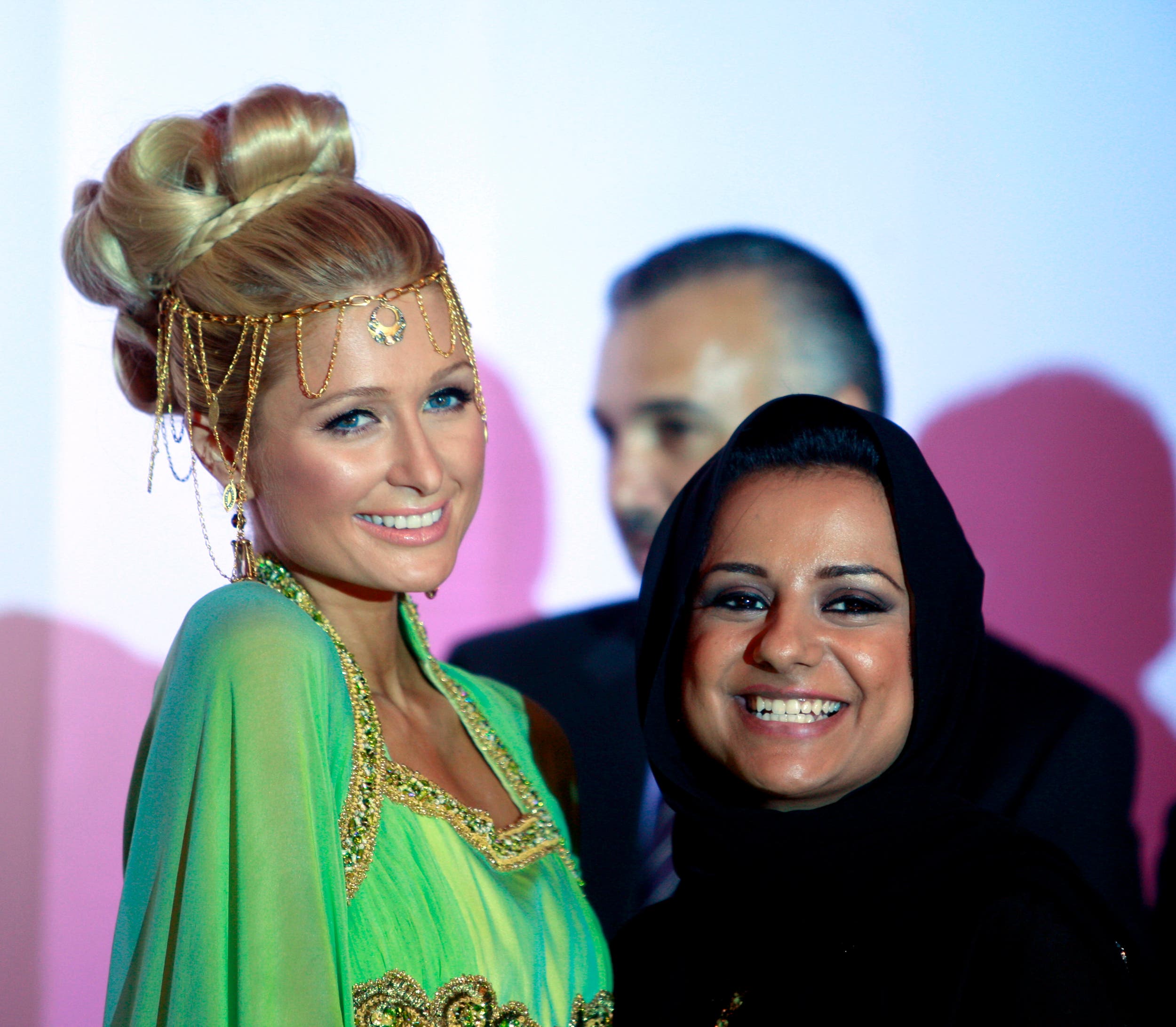 Paris Hilton with Nayla al-Khaja, chief executive officer of UAE-based D-Seven Motion Pictures production company, during a news conference in Dubai on June 17, 2009. (Reuters)