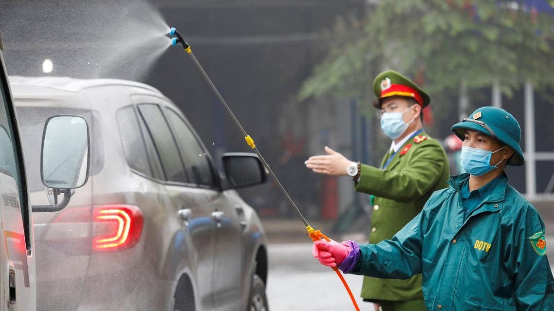 Members of anti-coronavirus team spray chemical into vehicles on a road in Thai Nguyen province, Vietnam February 7, 2020. (Photo: Reuters)