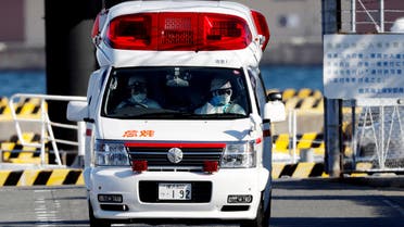 Ambulance workers in protective gear drive an ambulance near cruise ship Diamond Princess, at a maritime police's base in Yokohama, south of Tokyo, Japan February 5, 2020. (Reuters)