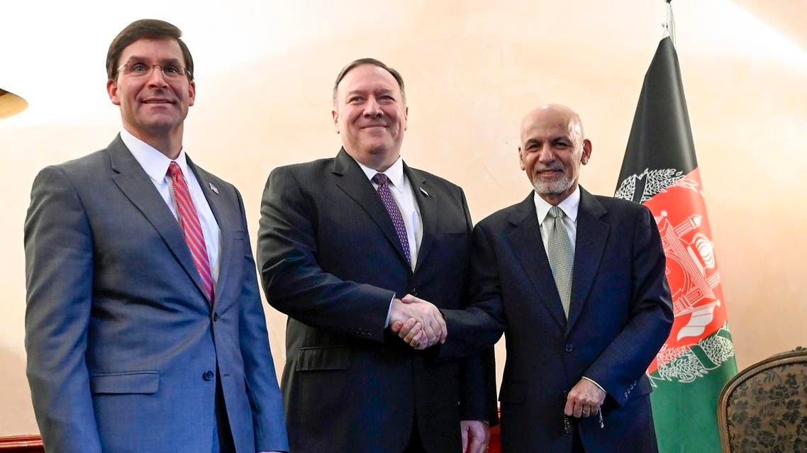 US Secretary of State Mike Pompeo, center, shakes hands with Afghan President Ashraf Ghani, right, as US Secretary of Defense Mark Esper watches during the 56th Munich Security Conference (MSC) in Munich, Germany, on Feb. 14, 2020. (AP)