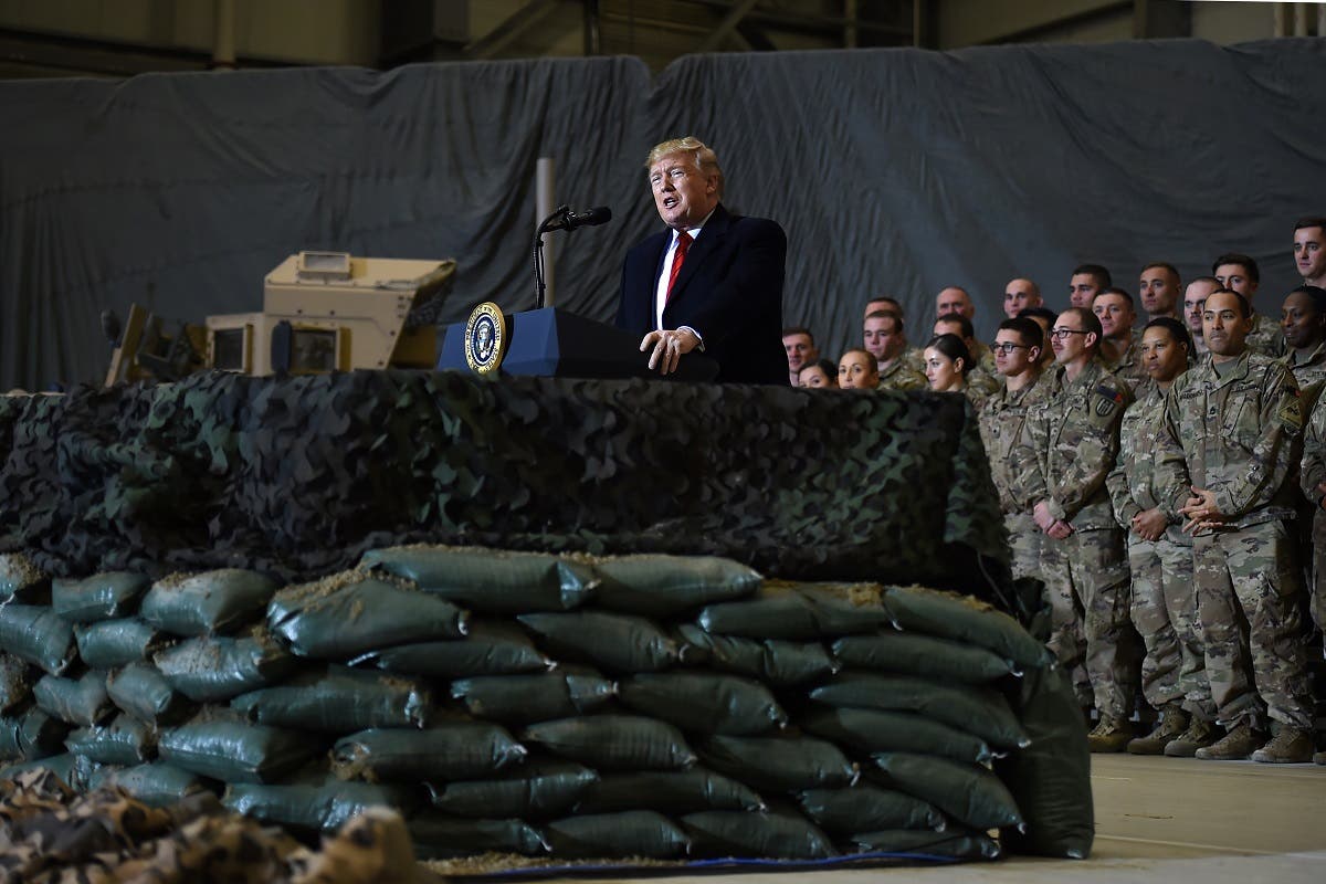 US President Donald Trump speaks to the troops during a surprise Thanksgiving day visit at Bagram Air Field, on November 28, 2019 in Afghanistan. (AFP)