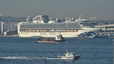 The Diamond Princess cruise ship is seen anchored at the Daikoku Pier Cruise Terminal in Yokohama port on February 13, 2020. At least 218 people on board a cruise ship quarantined off Japan have tested positive for the novel COVID-19 coronavirus, authorities said February 13 as they announced plans to move some elderly passengers off the ship.