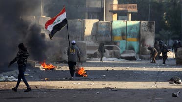 Iraqi protesters clash with riot police following an anti-government demonstration in the capital Baghdad. (AFP)