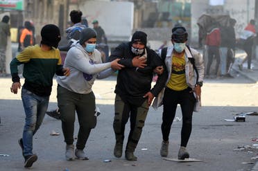 من تظاهرات العراق - مصابون قرب ساحة الخلاني في بغداد