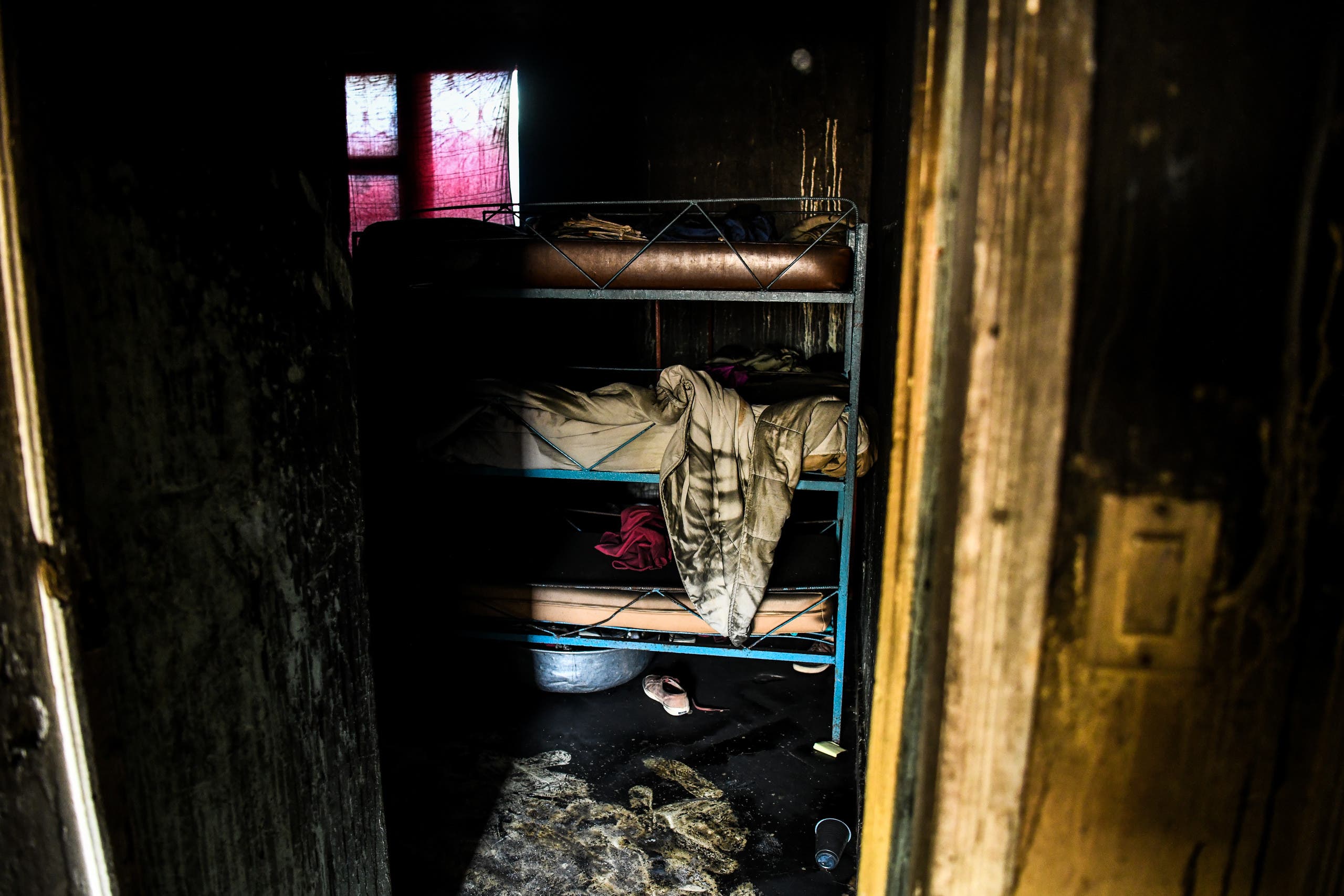 أسرة الأطفال في الميتم الذي نشب به الحريق