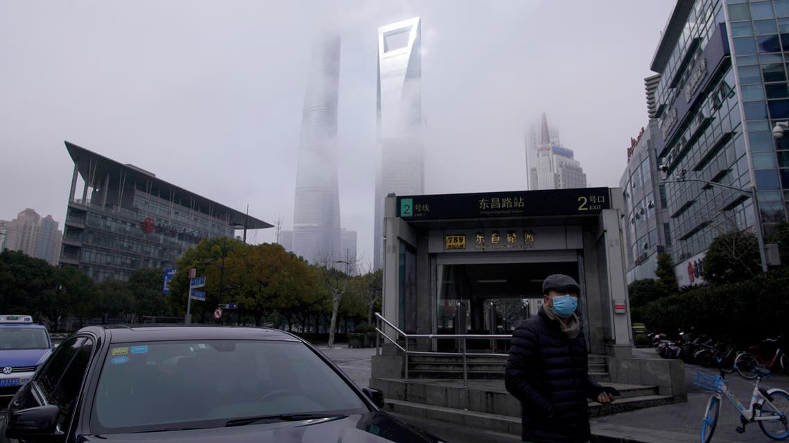 A man wearing a face mask is seen on a street in Shanghai, China, as the country is hit by an outbreak of the coronavirus, February 14, 2020. (Reuters)