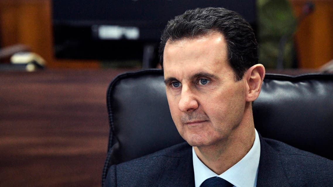 Syrian President Bashar Assad listens to Russian President Vladimir Putin during their meeting in Damascus, Syria, Tuesday, Jan. 7, 2020.