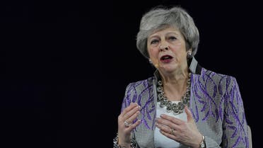 Former British Prime Minister Theresa May speaks at the Global Women's Forum in Dubai on Feb. 17, 2020. (AP)
