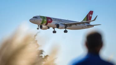 a plane of Portuguese TAP airline prepares to land at Humberto Delgado airport in Lisbon. (AFP)