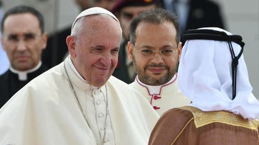 Pope Francis (L) shakes hands with a dignitary as he is accompanied by Abu Dhabi's Crown Prince Sheikh Mohammed bin Zayed al-Nahyan (R) during his welcome ceremony at the presidential palace in the UAE capital Abu Dhabi on February 4, 2019. (AFP)