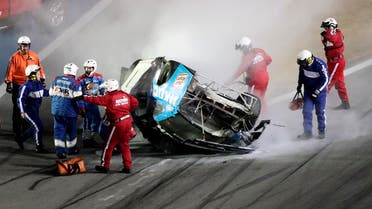 Rescue workers arrive to check on Ryan Newman after he was involved in a wreck on the last lap of the NASCAR Daytona 500 auto race. (Photo: AP)