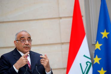 Then-Iraqi Prime Minister Adel Abdul Mahdi speaks during a joint statement with French President at the Elysee Palace in Paris, on May 3, 2019. (AFP)