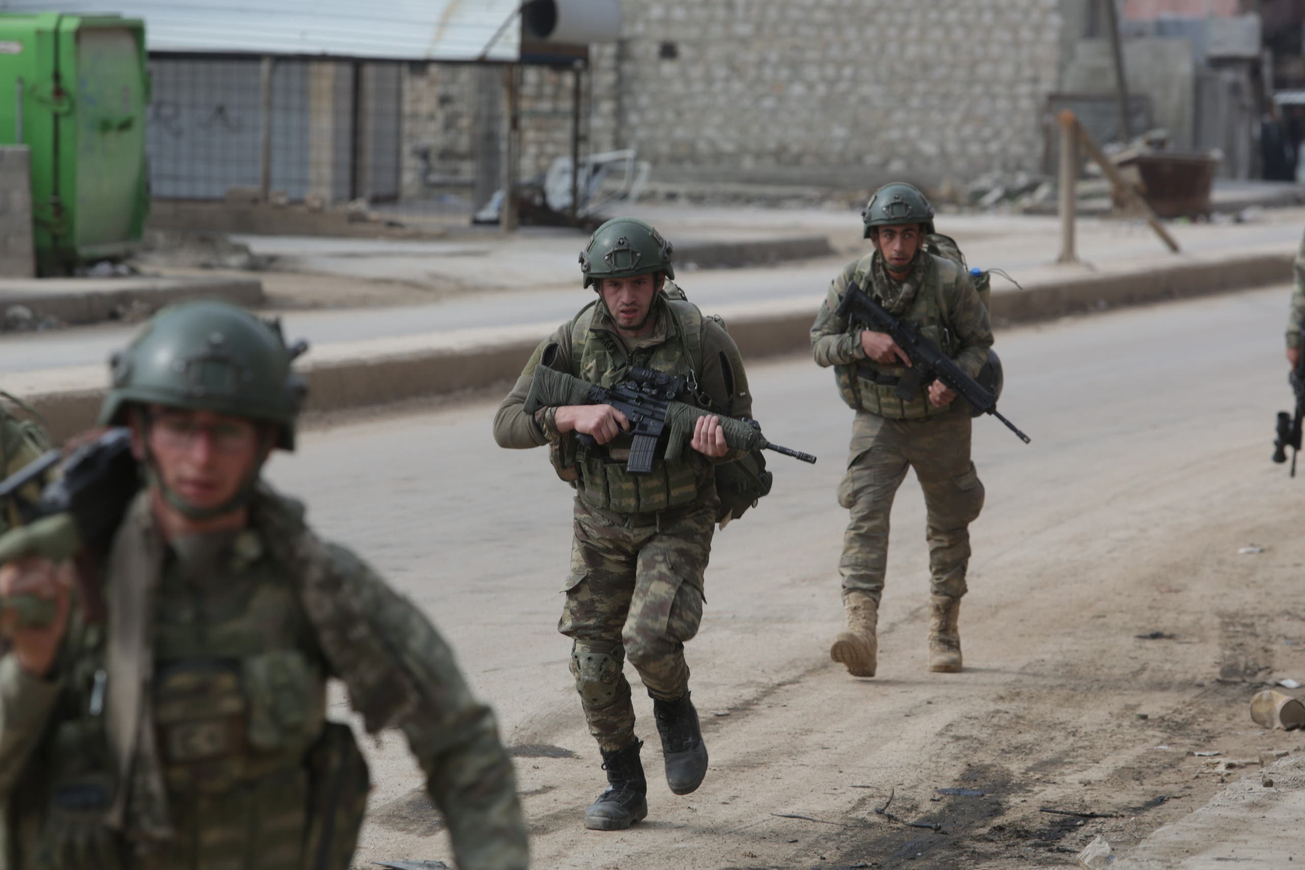 Turkish troops patrol in the town of Atareb in the opposition-held western countryside of Syria's Aleppo province on February 19, 2020. (AFP)