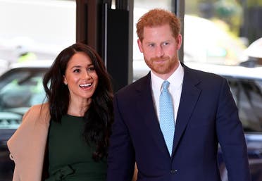 Britain's Prince Harry, Duke of Sussex (R), and his wife Meghan, Duchess of Sussex attend the annual WellChild Awards in London on October 15, 2019. (AFP)