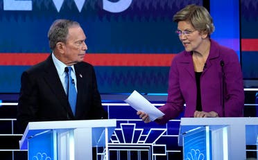 Former New York City Mayor Mike Bloomberg talks with Senator Elizabeth Warren during a break at the ninth Democratic 2020 U.S. Presidential candidates debate at the Paris Theater in Las Vegas Nevada, U.S., February 19, 2020. (Reuters)