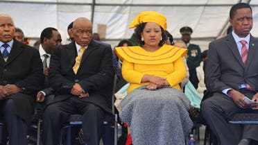 Newly appointed Lesotho prime Minister Thomas Thabane (L), leader of the All Basotho Convention (ABC) political party, his wife Maesaiah Thabane and Zambian President Edgar Lungu (R) attend Thabane's inauguration on June 16, 2017 in Maseru. Lesotho's new prime minister took office at the head of a coalition government, three years after he was targeted by a putsch and two days after the murder of his estranged wife.