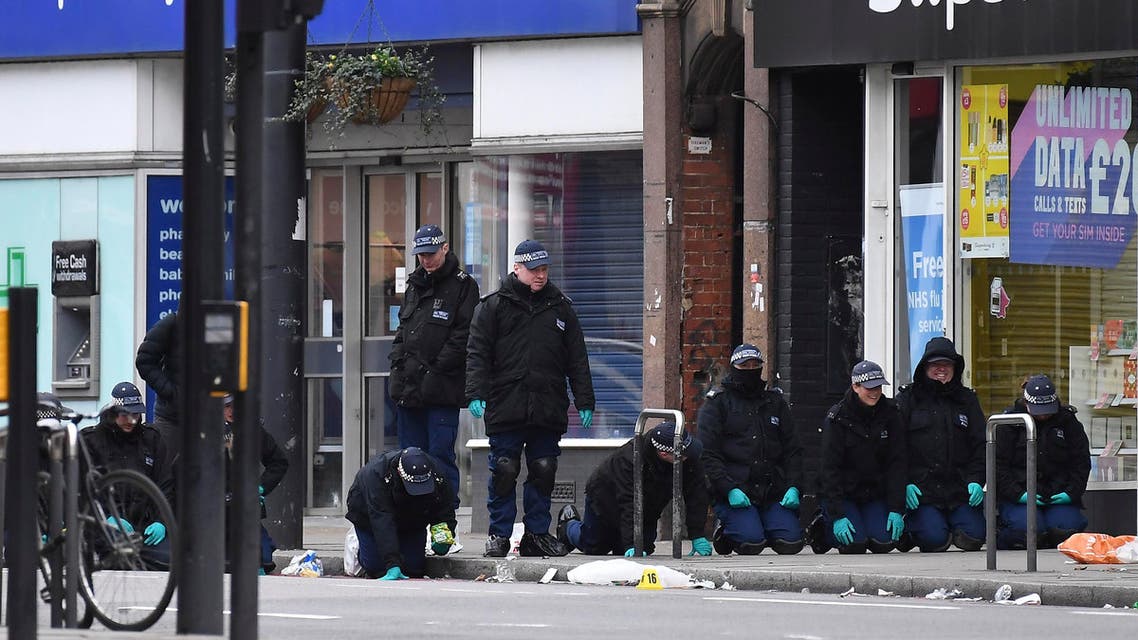Police officers work at the scene of Sunday's terror stabbing attack in the Streatham area of south London on Feb. 3, 2020. (AP)