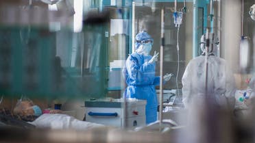 nurses work at an ICU ward specialised for patients infected by coronavirus in Wuhan in central China's Hubei Province. (AP)
