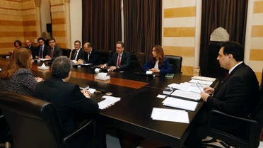 Lebanese Prime Minister Hassan Diab and officials meet with a team of IMF experts at the government palace in Beirut, on February 20, 2020. (Reuters)