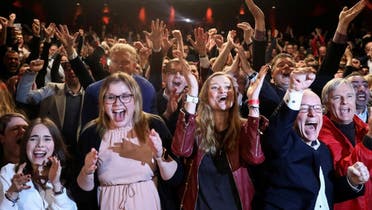 German Social Democratic Party (SPD) supporters react after first exit polls for the Hamburg state election in Hamburg, Germany, on February 23, 2020. (Reuters)