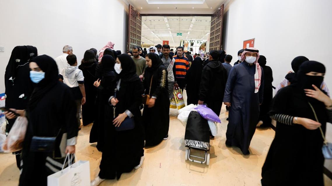 Locals wear face masks to take precautions from coronavirus, as they shop at the Bahrain's Autumn Fair 2020, in Manama, Bahrain January 29, 2020. (Reuters)