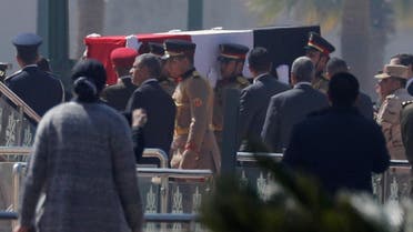 Guards carry the coffin of former Egyptian President Hosni Mubarak at Field Marshal Mohammed Hussein Tantawi Mosque, during his funeral east of Cairo. (Reuters)