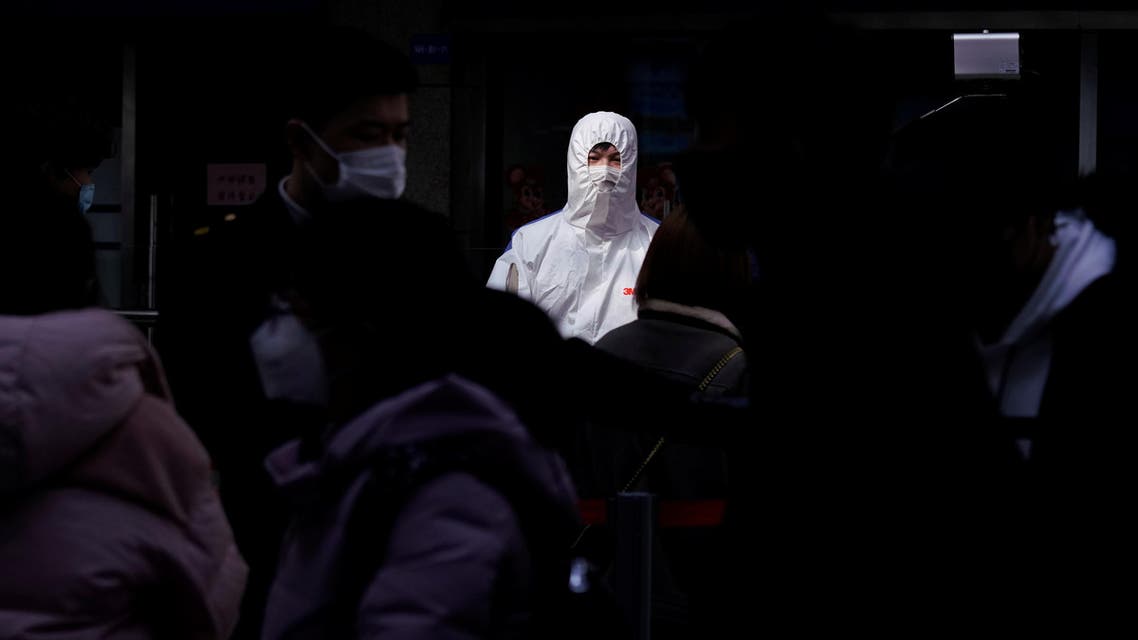 Passengers wearing masks are seen arrival at the Shanghai railway station in Shanghai, China, as the country is hit by an outbreak of a new coronavirus, February 27, 2020. Reuters