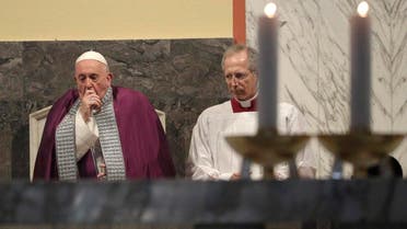 Pope Francis coughs inside the Basilica of Saint Anselmo prior to the start of a procession to the Basilica of Santa Sabina before the Ash Wednesday Mass opening Lent, in Rome. (AP)