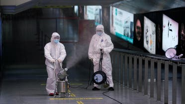 Workers with sanitizing equipment disinfect at the Shanghai railway station in Shanghai, China, as the country is hit by an outbreak of a new coronavirus, February 27, 2020.(Reuters)