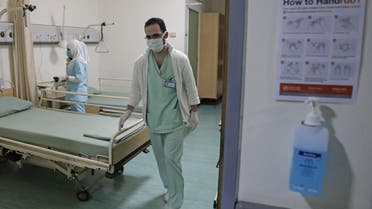 Lebanese nurses wearing protective masks work at a ward where the first case of coronavirus in the country is being treated. (File photo: AFP)