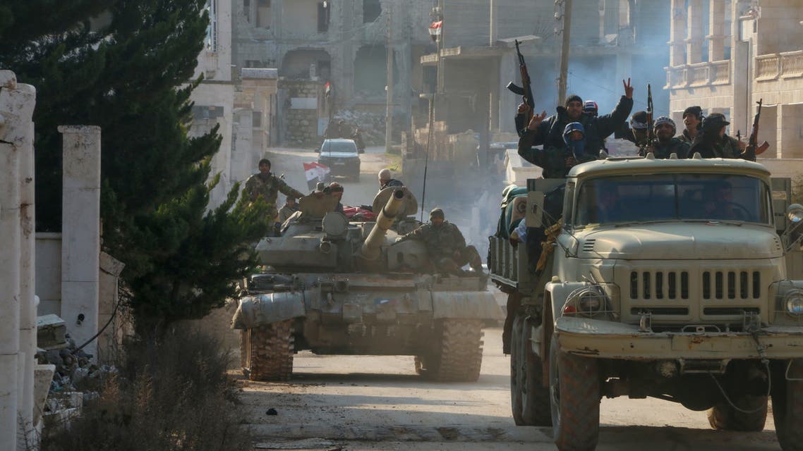Syrian army soldiers gather in the town of Kafr Hamra in the northern Aleppo countryside on February 17, 2020. In recent weeks, Syrian troops and allied forces backed by Russia have stepped up their offensive against rebel and jihadist groups in Idlib and the neighbouring province of Aleppo. They have already reconquered swathes of Idlib as well as key areas that have secured the crucial M5 highway connecting the country's four largest cities as well as the entire surroundings of Aleppo city for the first time since 2012.