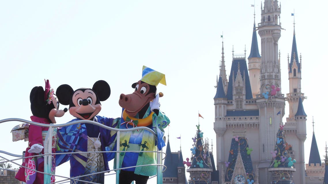 In this photo, Mickey Mouse, Minnie Mouse, and Horace Horsecollar entertain visitors to the Tokyo Disneyland. (File photo: AP)