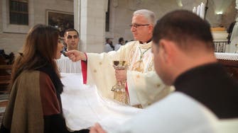 Catholic churches in Holy Land to give communion by hand due to coronavirus