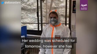 Watch: Iranian nurse in Tehran postpones wedding to treat coronavirus patients