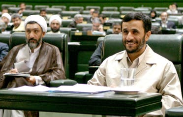 Mahmoud Ahmadinejad and the former Minister of Interior Mostafa Pourmohammadi. (File photo: Reuters)