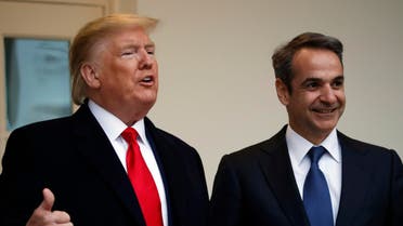 President Donald Trump and Greek Prime Minister Kyriakos Mitsotakis along the colonnade near the Oval Office of the White House in Washington. (AP)