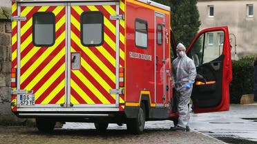 Members of emergency and intensive care services are at work after a person was allegedly contaminated by the new Covid-19 Coronavirus, on March 2, 2020 at Etienne Marie de la Hante retirement home in Crepy-en-Valois. (AFP)