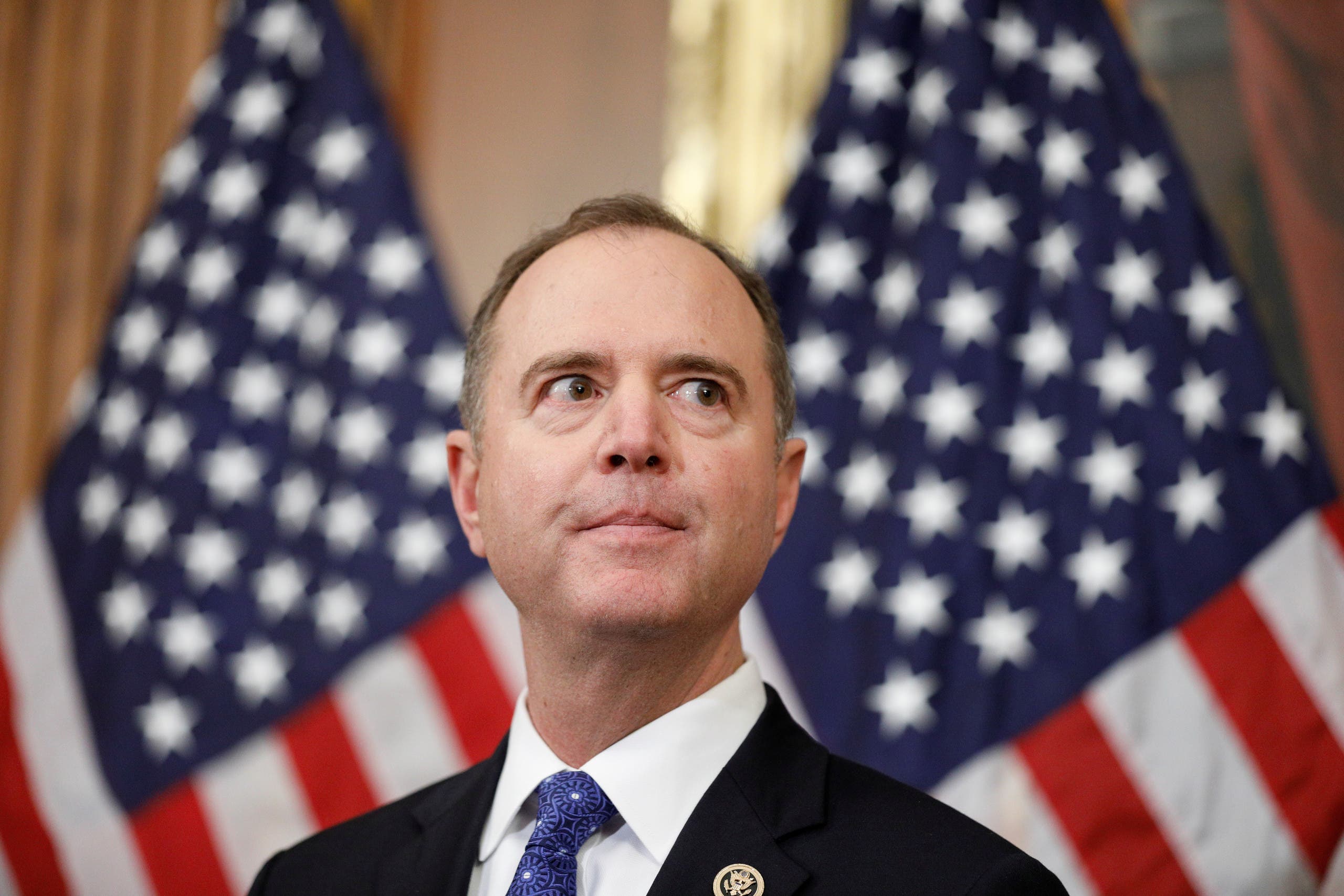 House Intelligence Committee Chairman Adam Schiff speaks to the media after voting on two articles of impeachment against US President Donald Trump on December 18, 2019. (Reuters)