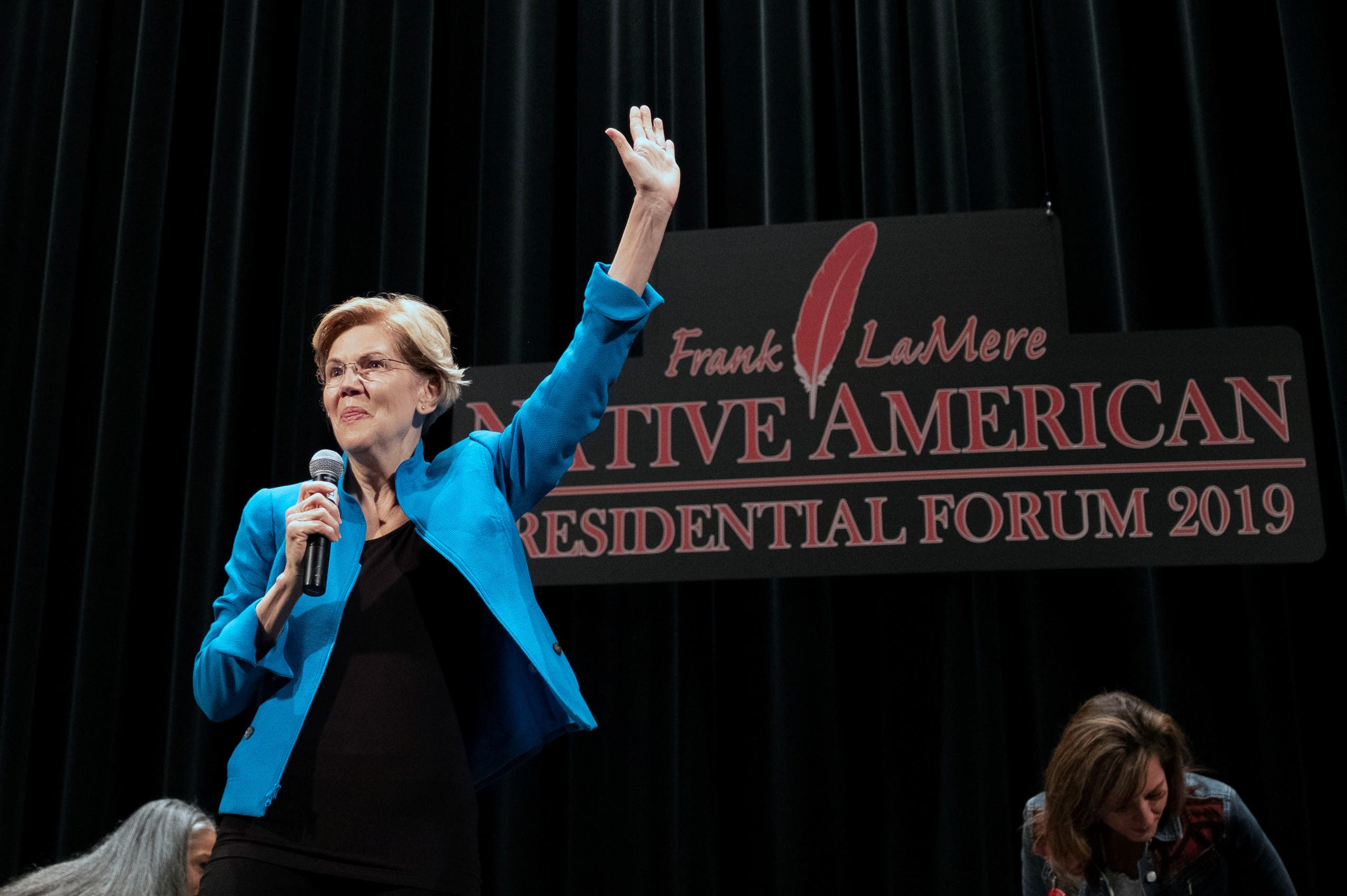 Democratic presidential candidate Elizabeth Warren waves as she arrives to the Frank LaMere Native American Forum in Iowa on August 19, 2019. (Reuters)