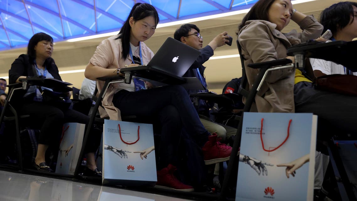 Journalists attend a Huawei event in Beijing on May 15, 2019. (AP)
