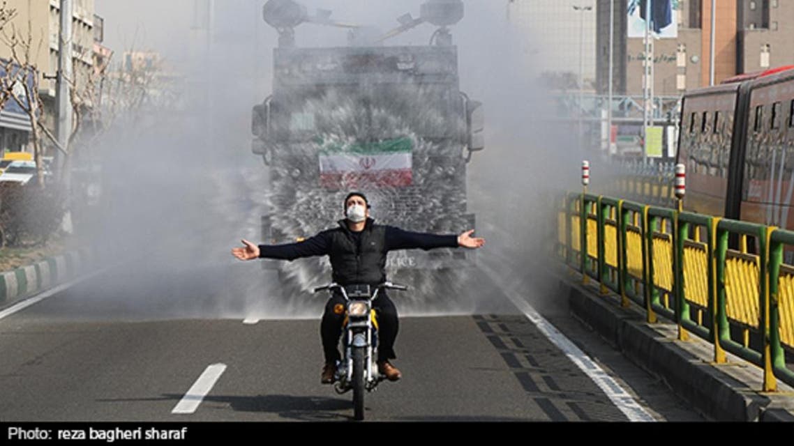 Iran is using police water cannons loaded with chemical spray to disinfect streets in Tehran. (Photo: Reza Bagheri Sharaf, Twitter)