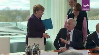 German interior minister refuses Merkel’s handshake amid coronavirus fears