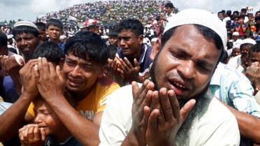 Rohingya refugees take part in a prayer as they gather to mark the second anniversary of the exodus at the Kutupalong camp in Cox’s Bazar. (Reuters)