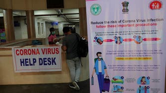 India reports first coronavirus death as new travel curbs imposed 