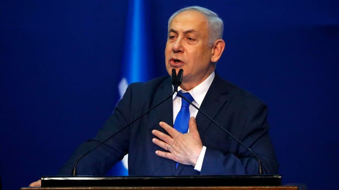 Israeli Prime Minister Benjamin Netanyahu addresses supporters at the Likud party campaign headquarters in the coastal city of Tel Aviv early on March 3, 2020, after polls officially closed. (AFP)