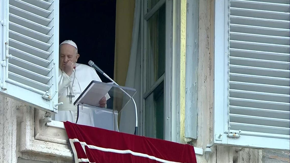 Pope Francis coughs as he leads the weekly Angelus prayer in St Peter's Square at the Vatican, March 1, 2020. (Reuters)